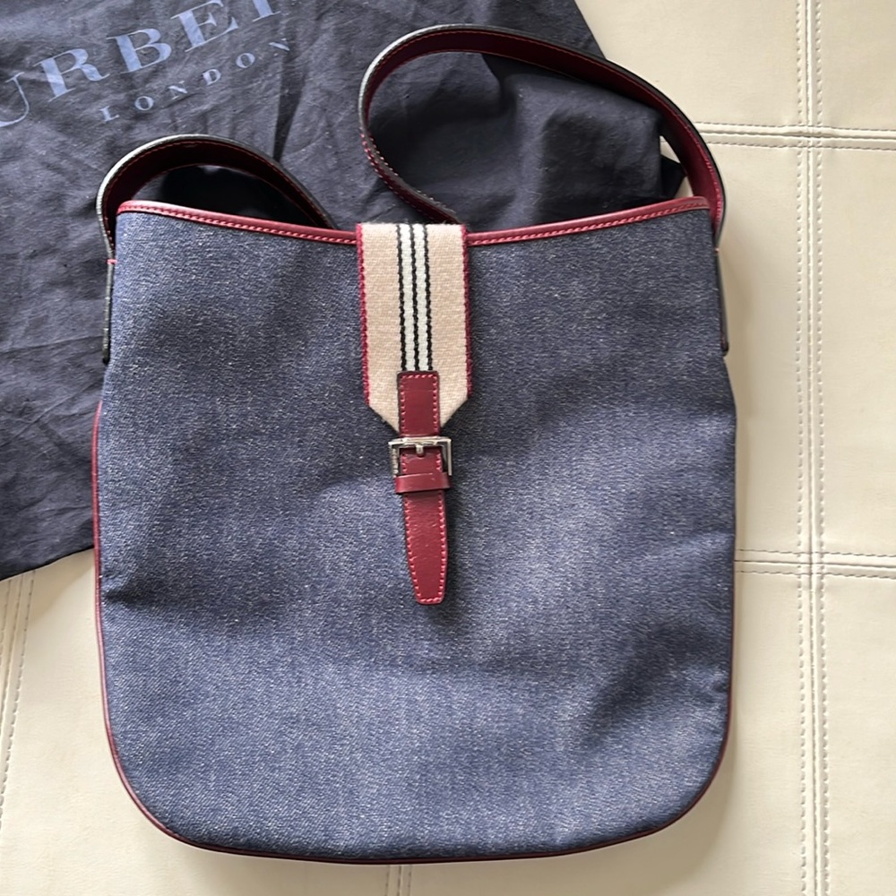 Authentic Burberry Denim Purse with dust bag. 28” strap